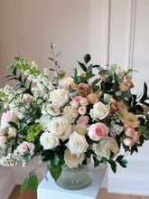 Load image into Gallery viewer, beautiful vase arrangement of sympathy flowers designed with white and pink roses and hints of greenery.