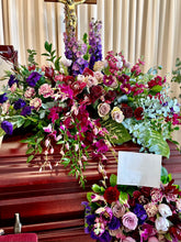 Load image into Gallery viewer, a mixture of fresh floral designed into a casket spray including roses, stock, cimbidium orchids, and mixed foliages