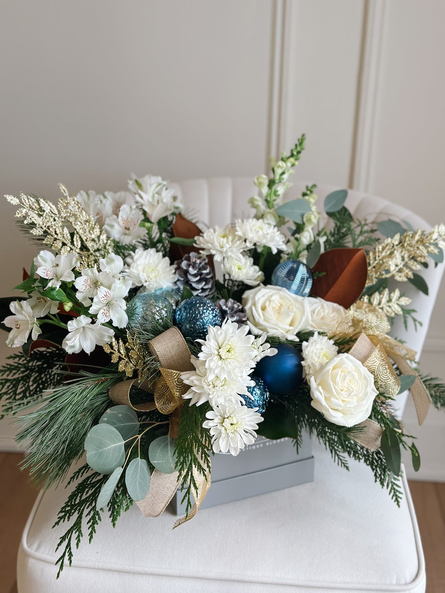 blue and white hanukkah flowers in a grey square box
